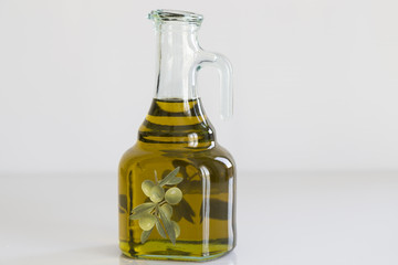 Olive oil concept with bottle . Eat olive oil for a healthy life.