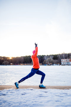 Portrait of sports woman on morning exercise in winter