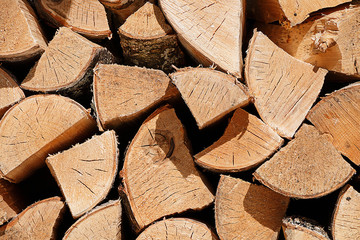 Wooden texture. Many harvested firewood