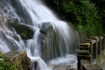 Fototapeta premium Beautiful waterfall cascade of moss stones summer