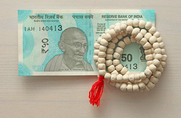 A new banknote of India with a denomination of 50 rupees. Indian currency. Mahatma Gandhi and...