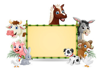 Obraz premium Farm animals with a blank sign bamboo 