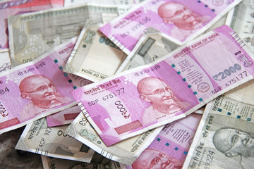 Indian money and banknotes, 500 rupees and 2,000 rupees. Background of paper Indian money