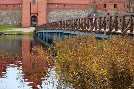 Trakai, Lithuania - November 7, 2017: Trakai Castle with a wooden bridge on the lake.