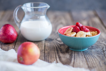 a jug of milk, apples and porridge