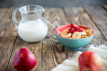 a jug of milk, apples and porridge