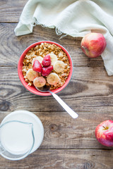 a jug of milk, apples and porridge