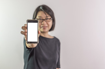 Asian woman showing blank smart phone