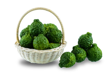 fresh bergamot fruit on wooden basket isolated on white background