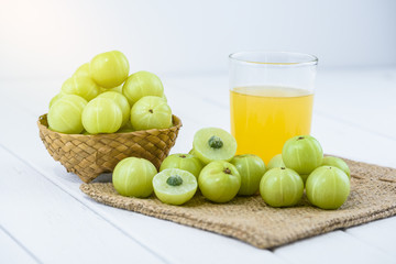 Indian gooseberry on wooden table