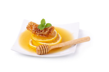 Lemon juice with honey isolated on a white background.