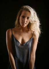 Naklejka premium Portrait of beautiful emotional woman with green eyes. Studio shot.