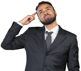 Young black businessman in a thoughtful mood isolated on white background