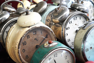 Group of various old alarm clocks