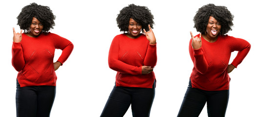 Young beautiful african plus size model making rock symbol with hands, shouting and celebrating with tongue out isolated over white background. Collection composition 3 figures collage