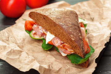 sandwich on a wooden table