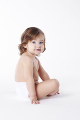 Girl sitting at studio shot