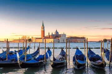 Tuinposter Venetian gondolas at sunrise on Grand Canal by San Marco square, Venice, Italy.  © lucky-photo