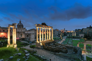 Naklejka premium Rome Forum with ruins of ancient architecture at night. Italy.