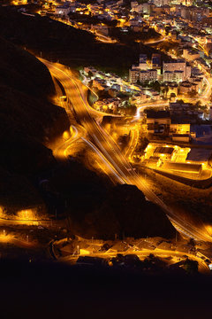 Road and illuminated city