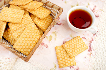 Cookies and tea on a light background. Morning romance and sloap.
