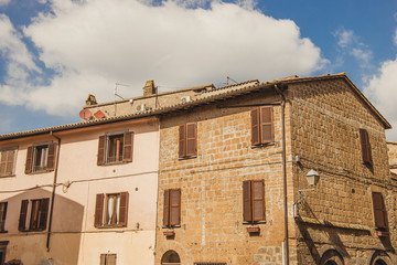 old buildings and cloudy sky in Orvieto, Rome suburb, Italy