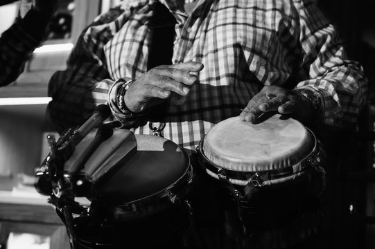 musician playing drums in in the night club