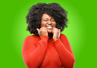 Beautiful african woman confident and happy with a big natural smile laughing