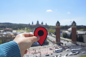 man with red marker in Montjuic, Barcelona, Spain.