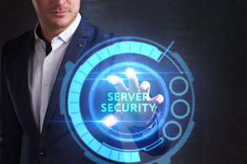 Business, Technology, Internet and network concept. Young businessman working on a virtual screen of the future and sees the inscription: Server security