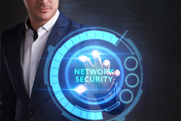 Business, Technology, Internet and network concept. Young businessman working on a virtual screen of the future and sees the inscription: Network security