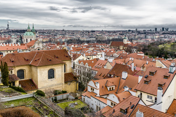 Obraz premium The roof and chimneys of the old Prague
