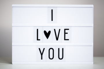 lightbox with text "I love You" on the table