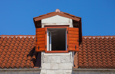Good view from the window with opened shutters at morning time