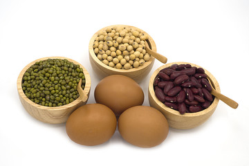 many mix seed green, red and soy bean, egg with wooden blow and spoon, Healthy and nutrition, high protein, food concept style