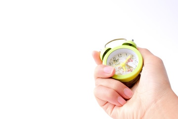 hand with alarm clock isolated against white background, time management concept.