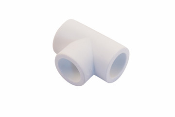 Fitting for plumbing installation - white tee made of PVC, isolated image on white background.