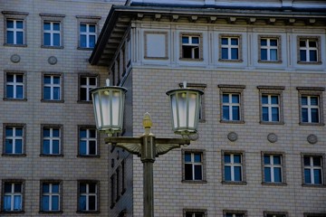 Fototapeta na wymiar street lamp on the background of an office building