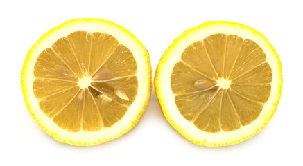 fresh organic heap of cut yellow lemon isolated on white background, slices, the taste is sour, from the garden, cooking, good health, can make smoothie in  summer with front view