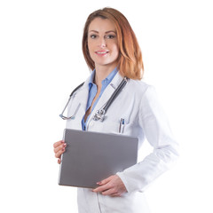 Portrait of a beautiful woman doctor with tablet isolated on white