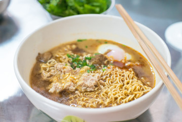 Instant noodles with pork and egg