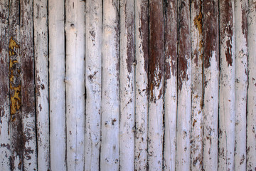 Fototapeta premium A fence made of logs white