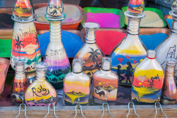 Souvenirs from Jordan - bottles with sand and shapes of desert and camels.