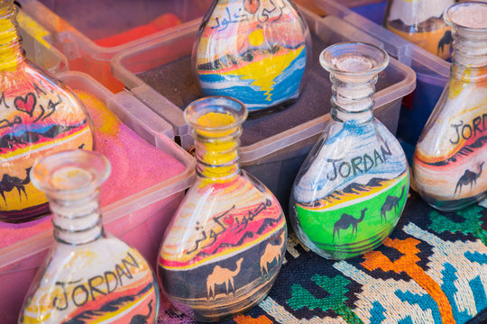 Souvenirs from Jordan - bottles with sand and shapes of desert and camels.