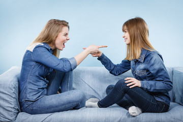 Two women friends having weird conversation