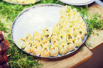 fresh Wonton Cups on brown wooden table