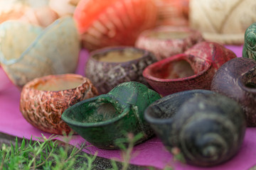 Many carved shellfish on the floor in shop