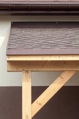 Asphalt shingles or bitumen tiles on the terrace and rooftop outdoor.