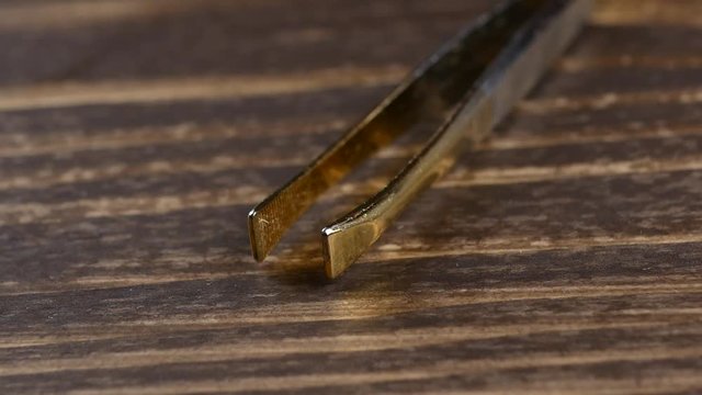 anatomical tweezers close up