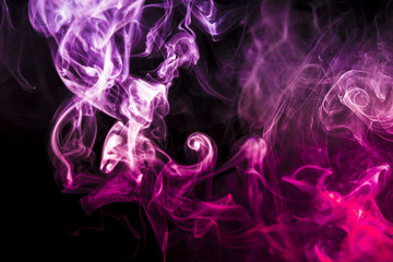 Colored smoke on black background